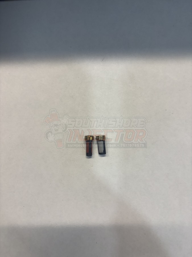 Yamaha OEM red mesh filter next to standard white mesh filter — same body, direct replacement