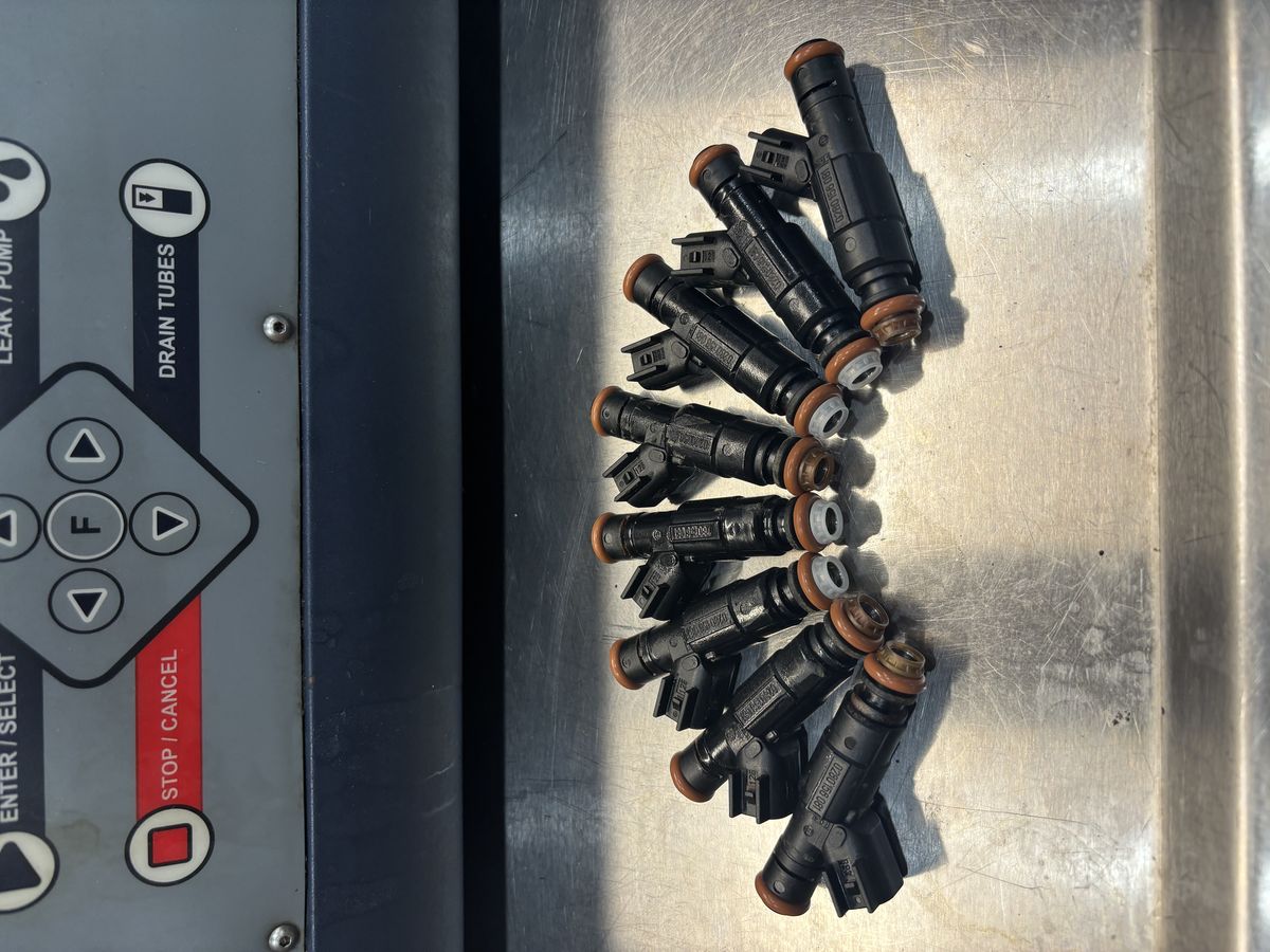 Batch of fuel injectors ready for cleaning